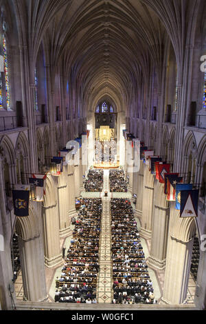 Attendees participate in the Matthew Shepard remembrance service at the Washington National Cathedral on October 26, 2018 in Washington, DC. Shepard was murdered in Wyoming twenty years ago and is to be interred at the National Cathedral. Photo by Leigh Vogel/UPI Stock Photo