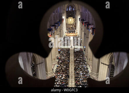 Attendees participate in the Matthew Shepard remembrance service at the Washington National Cathedral on October 26, 2018 in Washington, DC. Shepard was murdered in Wyoming twenty years ago and is to be interred at the National Cathedral. Photo by Leigh Vogel/UPI Stock Photo