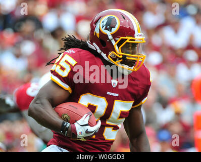 Washington Redskins running back Tim Hightower smiles as he leaves the  field following the Redskins 22-21 victory over the Arizona Cardinals at  FedEx Field in Washington on September 18, 2011. UPI/Kevin Dietsch