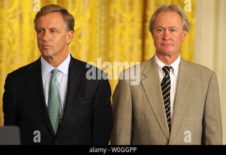 Governors Lincoln Chafee (Rhode Island, R) and Bill Haslam (Tennessee, 2nd,R) listen to remarks by U.S. President Barack Obama on reforming the No Child Left Behind education program, September 23, 2011 at the White House, Washington, DC. Obama called for the need to provide relief to states on certain provisions of the program, a legacy of previous President George W. Bush's administration.     UPI/Mike Theiler Stock Photo