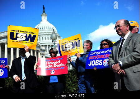 Members and supporters of the United Steelworkers and the International Association of Machinists and Aerospace Workers attend a rally opposing job killing free trade agreements on Capitol Hill in Washington, D.C. on September 4, 2011.  UPI/Kevin Dietsch Stock Photo