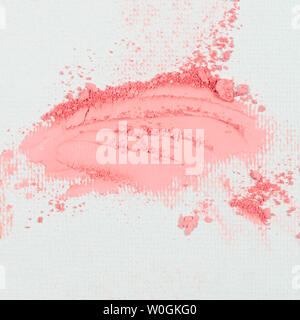 Eye shadow or bronzer pink smudge on white background. Stock Photo