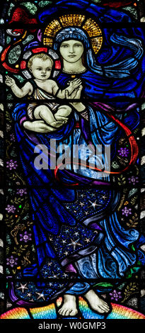 Karl Parsons' (1927) depiction of Mary and the infant Jesus, St Marys Church, Bibury, Gloucestershire, UK Stock Photo