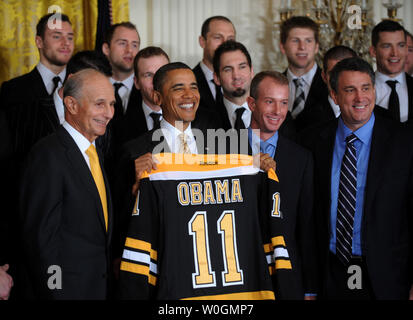 NHL's Stanley Cup rests on a table in front of a portrait of Martha  Washington, wife of first president George Washington, just prior to U.S.  President Barack Obama honoring the players and