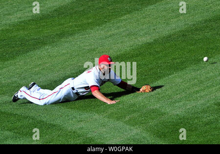 Photo: Washington Nationals shortstop Adrian Sanchez misses a ball