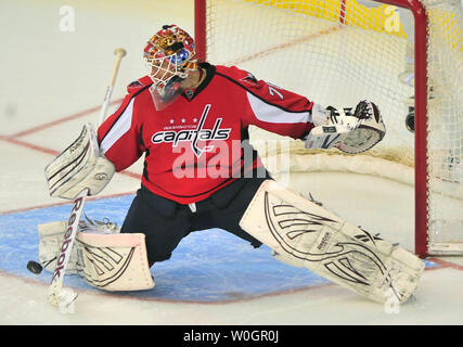 Washington Capitals goalie Braden Holtby makes a save during the third period of game 4 of the NHL Eastern Conference Quarterfinals at the Verizon Center in Washington, D.C. on April 19, 2012.  UPI/Kevin Dietsch Stock Photo