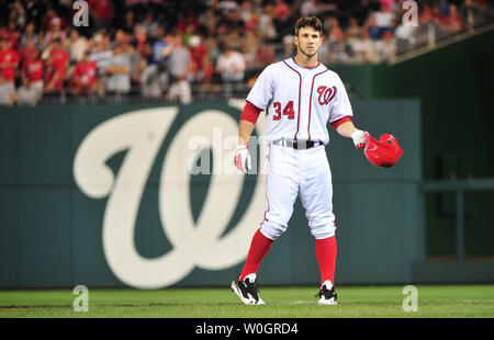 Washington Nationals Bryce Harper walks off after hitting a group out  single against the Philadelphia Phillies in the sixth inning at Nationals  Park in Washington, D.C. on April 28, 2016. Photo by