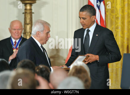 Adam Daniel Rotfeld, former Polish Foreign Minister, receives a Presidential Metal of Freedom forJan Karski from President Barack Obama in the East Room at the White House in Washington on May 29, 2012. The Medal of Freedom is our Nation's highest civilian honor, presented to individuals who have made especially meritorious contributions to the security or national interests of the United States, to world peace, or to cultural or other significant public or private endeavors.   UPI/Kevin Dietsch Stock Photo