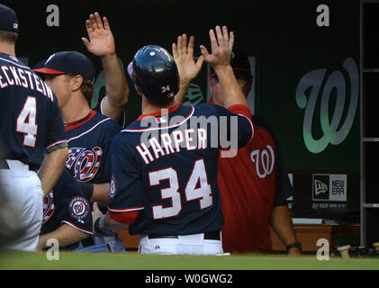 Philadelphia, Pennsylvania, USA. 6th Apr, 2019. Minnesota Twins catcher  Willians Astudillo (64) holds up the ball after tagging Philadelphia  Phillies right fielder Bryce Harper (3) out at home with relief pitcher  Adalberto