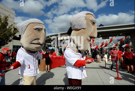 Washington Nationals mascots George Washington and Tom Jefferson entertain fans as they enter Nationals Stadium for game three of the NLDS playoff against the St. Louis Cardinals and the Washington Nationals on October 10, 2012 in Washington, DC.  This is the first playoff game in Washington since 1933.   UPI/Pat Benic Stock Photo