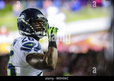 Seattle Seahawks Michael Robinson tells the crowd to hush after his touchdown during first quarter action at FedEx Field during the NFC Wild Card round in Landover, Maryland on January 6, 2013. The Redskins lead the Seahawks 14-13 at Halftime. UPI/Pete Marovich Stock Photo