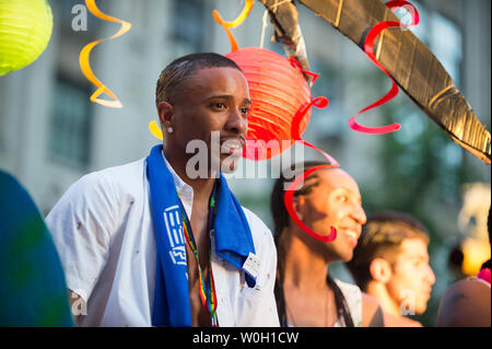 NEW YORK CITY - JUNE 25, 2017: Participants at the annual Pride Parade ride a float as it passes through Greenwich Village. Stock Photo