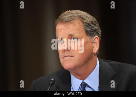 Douglas Parker, chairman and CEO, US Airways Group, testify during a Senate Judiciary Subcommittee on Antitrust, Competition Policy and Consumer Rights hearing on the American Airlines-US Airways Merger, on Capitol Hill on March 19, 2013.  UPI/Kevin Dietsch Stock Photo