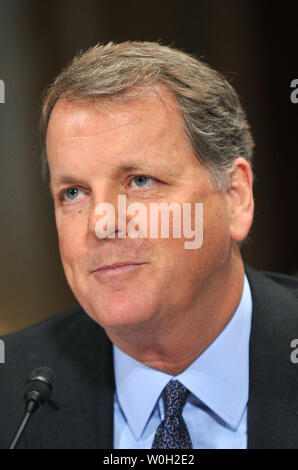 Douglas Parker, chairman and CEO, US Airways Group, testify during a Senate Judiciary Subcommittee on Antitrust, Competition Policy and Consumer Rights hearing on the American Airlines-US Airways Merger, on Capitol Hill on March 19, 2013.  UPI/Kevin Dietsch Stock Photo