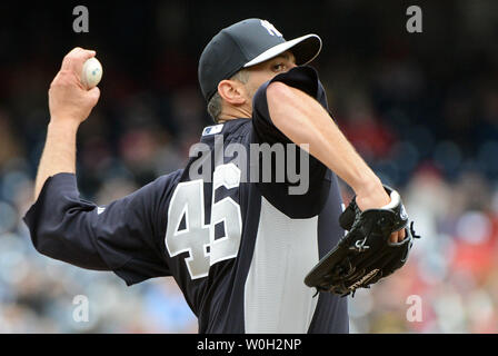 New York Yankees pitcher Andy Pettite pitches against the Washington Nationals during the first inning at Nationals Park on Mach 29, 2013 in Washington, D.C. UPI/Kevin Dietsch Stock Photo