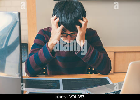 Professional programmer working and stress in programming website a software and coding technology, writing codes and data code, Programming with HTML Stock Photo