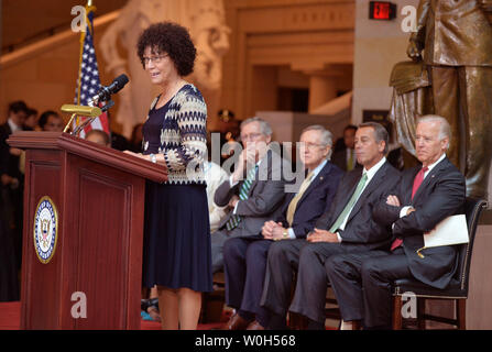 Nettie Washington Douglass, the great great granddaughter of Frederick Douglass, speaks during a dedication ceremony for the new Frederick Douglass statue in Emancipation Hall of the United States Capitol Visitor Center on June 19, 2013 in Washington, D.C. The statue is a gift from the District of Columbia. Seated behind Douglass, from left to right, Senate Minority Leader Mitch McConnell (R-KY), Senator Majority Leader Harry Reid (D-NV), Speaker John Boehner (R-OH) and Vice President Joe Biden.   UPI/Kevin Dietsch Stock Photo