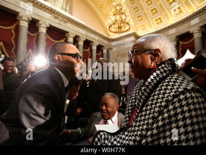 Film maker Spike Lee talks with Maxine McNair, mother of Denise McNair, victim of the 1963 Birmingham bombing, during a Congressional Gold Medal ceremony which was posthumously presented to victims of the bombing at the U.S. Capitol, in Washington on September 10, 2013.  The medal is awarded in recognition of victims Addie Mae Collins, Denise McNair, Carole Robertson and Cynthia Wesley, and how their sacrifice served as a catalyst for the Civil Rights Movement.  McNair and her husband Christopher (lower C) are the last surviving parents of the 4 victims.  UPI/Molly Riley Stock Photo