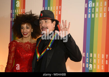 Carlos Santana and wife Cindy Blackman are seen strolling in Soho