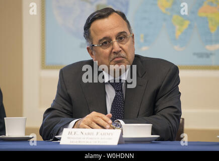 Egyptian Foreign Minister Nabil Fahmy speaks during a meeting with House Foreign Affairs Committee Chairman Rep. Ed Royce (R-CA) on Capitol Hill in Washington, D.C. on April 28, 2014.  UPI/Kevin Dietsch Stock Photo