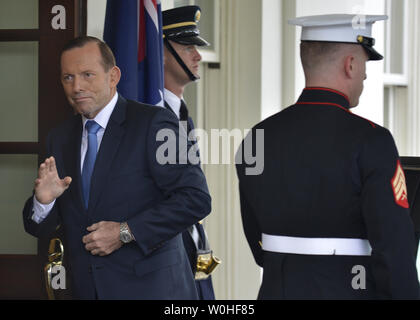 Australian Prime Minister Tony Abbott arrives at the West Wing of the White House for a bilateral meeting with President Barack Obama, June 12, 2014, in Washington, DC. The two leaders are expected to discuss their trans-Pacific partnership, Australia's G-20 leadership and Asia-Pacific security issues.               UPI/Mike Theiler Stock Photo
