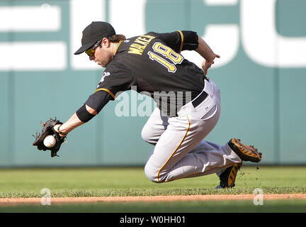 Pittsburgh Pirates second baseman Neil Walker (18) fields a ball against the Washington Nationals at Nationals Park on August 17, 2104 in Washington, D.C. The Nationals defeated the Pirates 6-5. UPI/Kevin Dietsch Stock Photo