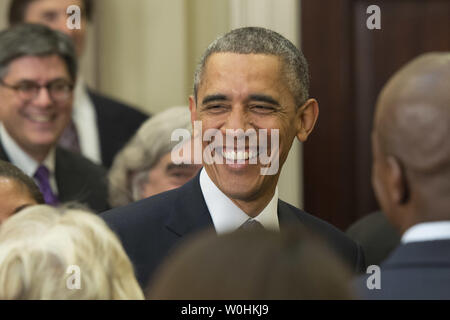 President Barack Obama greets audience members after announcing Ashton Carter as his nominee to be the next Defense Secretary on December 5, 2014 in Washington, D.C. If confirmers Carter will be replacing current Defense Secretary Chuck Hagel who announces his resignation last month. UPI/Kevin Dietsch Stock Photo