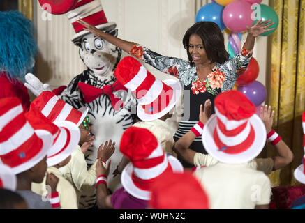 First Lady Michelle Obama dances with school children after reading Dr. Seuss’s book, 'Oh, The Things You Can Do That Are Good for You: All About Staying Healthy,'  in the East Room at the White House in Washington, D.C. on January 21, 2015. The event was part of the First Lady's Let's Move! initiative to inform children about making health life decisions and staying active. Photo by Kevin Dietsch/UPI Stock Photo