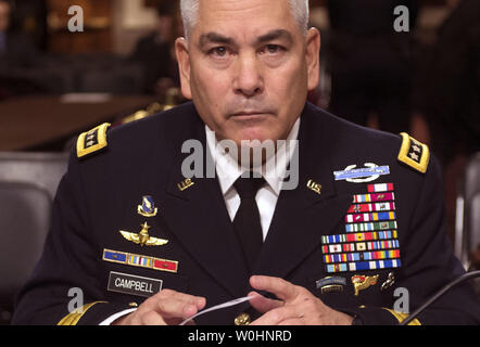 Army Gen. John Campbell prepares to testify during a Senate Armed Services Committee hearing on the situation in Afghanistan, on Capitol Hill in Washington, D.C. on February 11, 2015. Photo by Kevin Dietsch/UPI Stock Photo