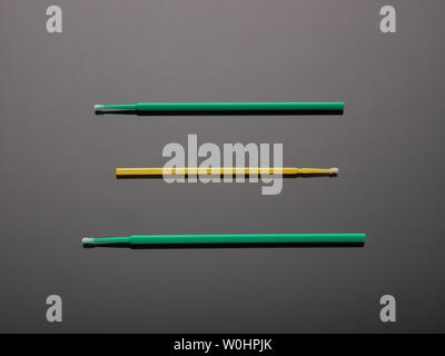 Dental brushes on a gray background with a gradient Stock Photo