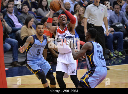 Washington Wizards forward Paul Pierce shoots for two against Memphis Grizzlies guard Courtney Lee (5) and Jeff Green (32) during the third quarter at the Verizon Center in Washington, D.C. on March 12, 2015. Photo by Kevin Dietsch/UPI Stock Photo