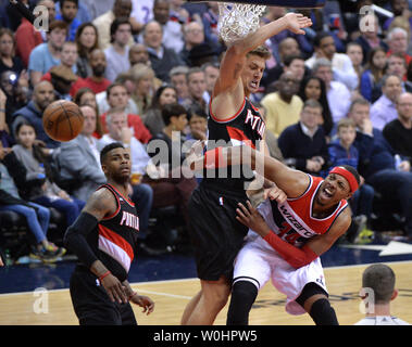 Washington Wizards forward Paul Pierce (34) is fouled by Portland Trail Blazers center Meyers Leonard (11) in the second half at the Verizon Center in Washington, D.C. on March 16, 2015.  Photo by Kevin Dietsch/UPI Stock Photo