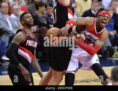 Washington Wizards forward Paul Pierce (34) is fouled by Portland Trail Blazers center Meyers Leonard (11) in the second half at the Verizon Center in Washington, D.C. on March 16, 2015.  Photo by Kevin Dietsch/UPI Stock Photo