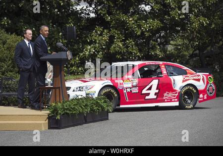 President Barack Obama welcomes Kevin Harvick and his Stewart-Haas Racing team members to the White House to honor his 2014 NASCAR Sprint Cup Series championship, on the South Lawn of the White House in Washington, D.C. on April 21, 2015.  Photo by Kevin Dietsch/UPI Stock Photo