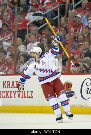 New York Rangers Martin St. Louis reacts after scoring the game