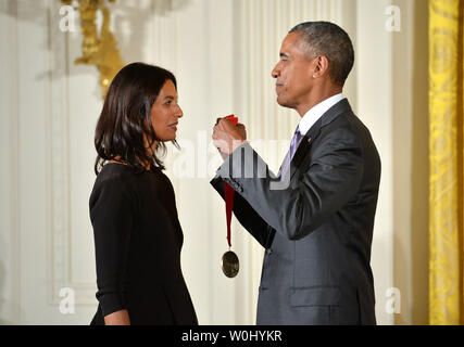 President Barack Obama awards a 2014 National Humanities Medal to author Jhumpa Lahiri during a ceremony at the White House in Washington, D.C. on September 10, 2015.  Photo by Kevin Dietsch/UPI Stock Photo