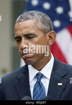 U.S. President Barack Obama pauses during joint press conference with Chinese President Xi Jinping when he was asked a question about the resignation of House Speaker John Boehner, in the Rose Garden of the White House in Washington, DC on September 25, 2015.  Xi and Obama agreed not to conduct or support cybercrime hacking.     Photo by Pat Benic/UPI Stock Photo