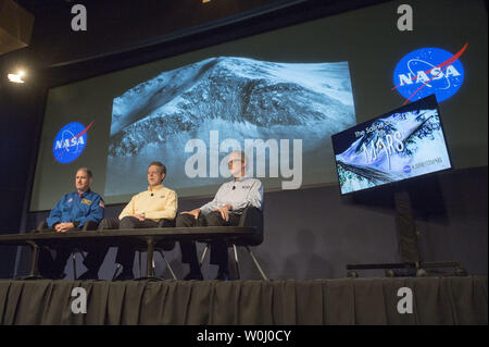 From left to right, John M. Grunsfeld, Associate Administrator for the Science Mission Directorate at NASA, Jim Green, director of planetary science at NASA, and Michael Meyer, lead scientist for the Mars Exploration Program at NASA Headquarters, announce that NASA has confirmed that liquid water flows on the surface of Mars, during a press conference at NASA headquarters in Washington, D.C. on September 28, 2015. NASA's Mars Reconnaissance Orbiter (MRO) provided the strongest evidence yet that liquid water flows intermittently on present-day Mars which opens up the idea that life of some kind
