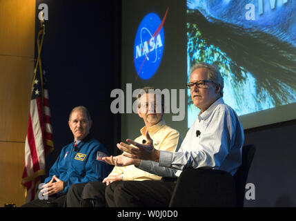From left to right, John M. Grunsfeld, Associate Administrator for the Science Mission Directorate at NASA, Jim Green, director of planetary science at NASA, and Michael Meyer, lead scientist for the Mars Exploration Program at NASA Headquarters, announce that NASA has confirmed that liquid water flows on the surface of Mars, during a press conference at NASA headquarters in Washington, D.C. on September 28, 2015. NASA's Mars Reconnaissance Orbiter (MRO) provided the strongest evidence yet that liquid water flows intermittently on present-day Mars which opens up the idea that life of some kind