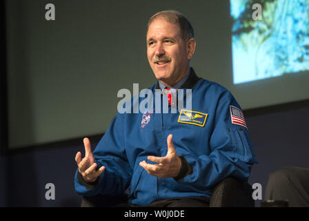 John M. Grunsfeld, Associate Administrator for the Science Mission Directorate at NASA, speaks at a press conference announcing that NASA has confirmed that liquid water flows on the surface of Mars, at NASA headquarters in Washington, D.C. on September 28, 2015. NASA's Mars Reconnaissance Orbiter (MRO) provided the strongest evidence yet that liquid water flows intermittently on present-day Mars which opens up the idea that life of some kind may exist now or in the past on Mars.  Photo by Kevin Dietsch/UPI Stock Photo