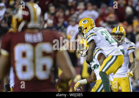 Green Bay Packers defenders Ha Ha Clinton-Dix (21) and LaDarius Gunter (36) celebrate breaking up a pass intended for Washington Redskins' Jordan Reed (86) during the second half of their NFC Wild Card game at FedEx Field in Landover, Maryland, January 10, 2016. Green Bay won 35-18. Photo by David Tulis/UPI Stock Photo