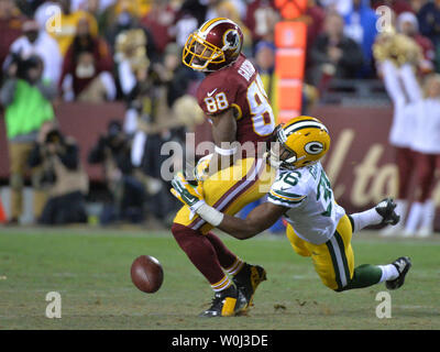 Green Bay Packers cornerback LaDarius Gunter (36) breaks up a pass intended for Washington Redskins wide receiver Pierre Garcon (88) in the third quarter of their NFC Wild Card game at FedEx Field in Landover, Maryland on January 10, 2015. The Packers defeated the Redskins 35-18. Photo by Kevin Dietsch/UPI Stock Photo