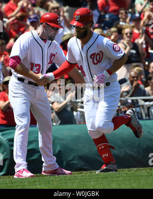 Washington Nationals Bryce Harper pops up in the eighth inning against the  Atlanta Braves at Nationals Park in Washington, DC on April 14, 2016. Harper  hit a grand-slam home run in the