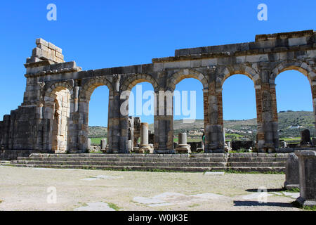 Volubilis was a Roman city, the ruins of which are currently partially excavated an archaeological site, situated on the Marocco. Stock Photo