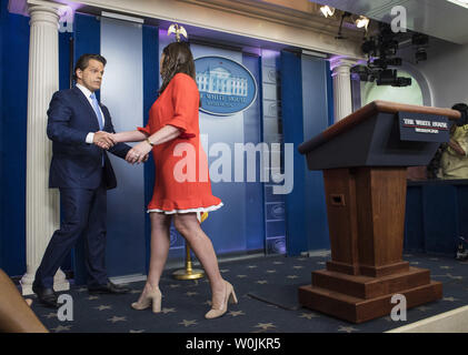 Newly announced White House Communications Director Anthony Scaramucci shakes hands with Principal Deputy White House Press Secretary Sarah Huckabee Sanders during the daily press briefing, at the White House in Washington, D.C. on July 21, 2017. The White House announced that Sanders will be replacing outgoing White House Press Secretary Sean Spicer, who announced his resignation today. Photo by Kevin Dietsch/UPI Stock Photo