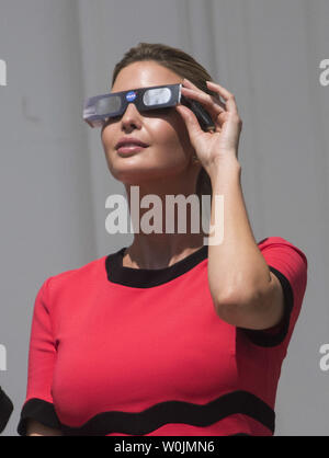 Ivan Trump, the daughter of President Donald Trump, wears special solar glasses as she view the solar eclipse from the White House in Washington, D.C. on August 21, 2017. Photo by Kevin Dietsch/UPI Stock Photo