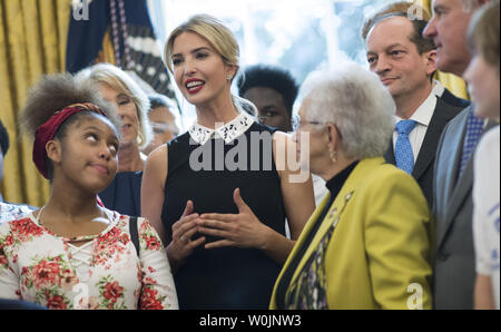 Ivan Trump, the daughter of President Donald Trump delivers remarks alongside students and members of congress and her father's administration, before President Trump signed a memorandum to expand access to STEM (science, technology, engineering and math) education in the Oval Office at the White House in Washington, D.C. on September 25, 2017. Photo by Kevin Dietsch/UPI Stock Photo