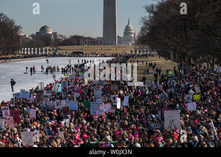 A large crowd fills up the reflecting pond in front of the Lincoln Memorial in Washington, D.C. on January 20, 2018. This is the one year anniversary of the Women's March where hundreds of thousands gathered in DC and all over the United States in support of women and to protest Donald Trump's election to President of the United States.     Photo by Ken Cedeno/UPI Stock Photo