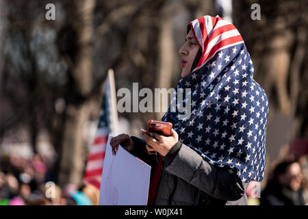 Shabina Shahnawaz, 31, from Richmond, VA. attends the large crowd in front of the Lincoln Memorial in Washington, D.C. on January 20, 2018. This is the one year anniversary of the Women's March where hundreds of thousands gathered in DC and all over the United States in support of women and to protest Donald Trump's election to President of the United States.     Photo by Ken Cedeno/UPI Stock Photo