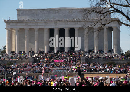 A large crowd fills up the reflecting pond in front of the Lincoln Memorial in Washington, D.C. on January 20, 2018. This is the one year anniversary of the Women's March where hundreds of thousands gathered in DC and all over the United States in support of women and to protest Donald Trump's election to President of the United States.     Photo by Ken Cedeno/UPI Stock Photo